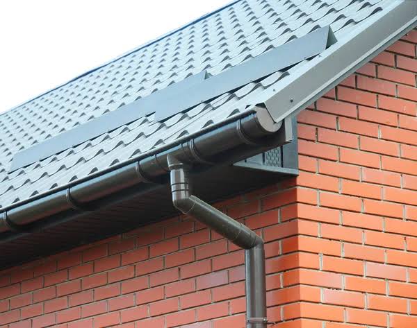 Gutter Systems in Buildings: Protecting Your Property from Water Damage by Dennis Isong 